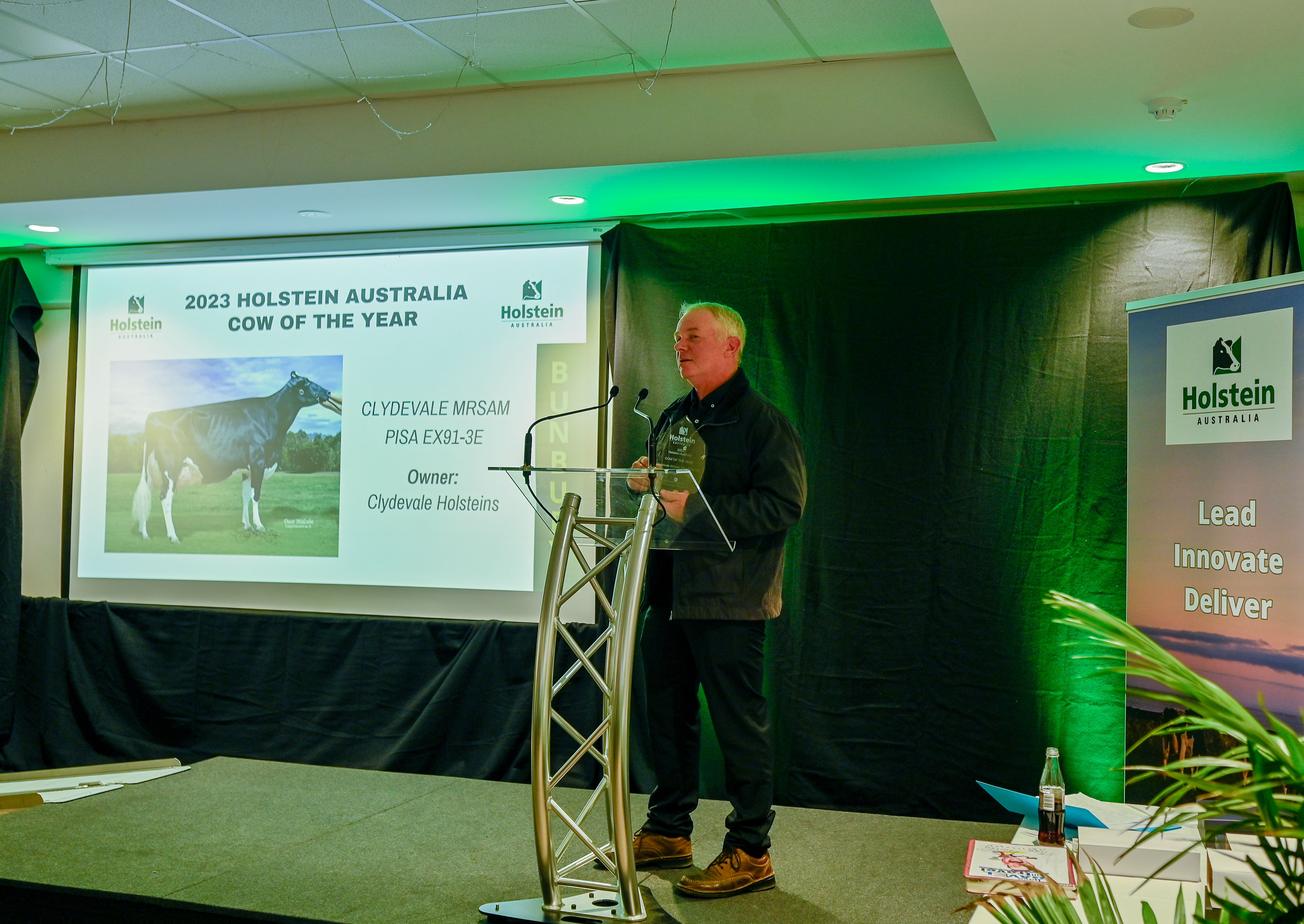 Adam Dee accepting the Cow of the Year Award