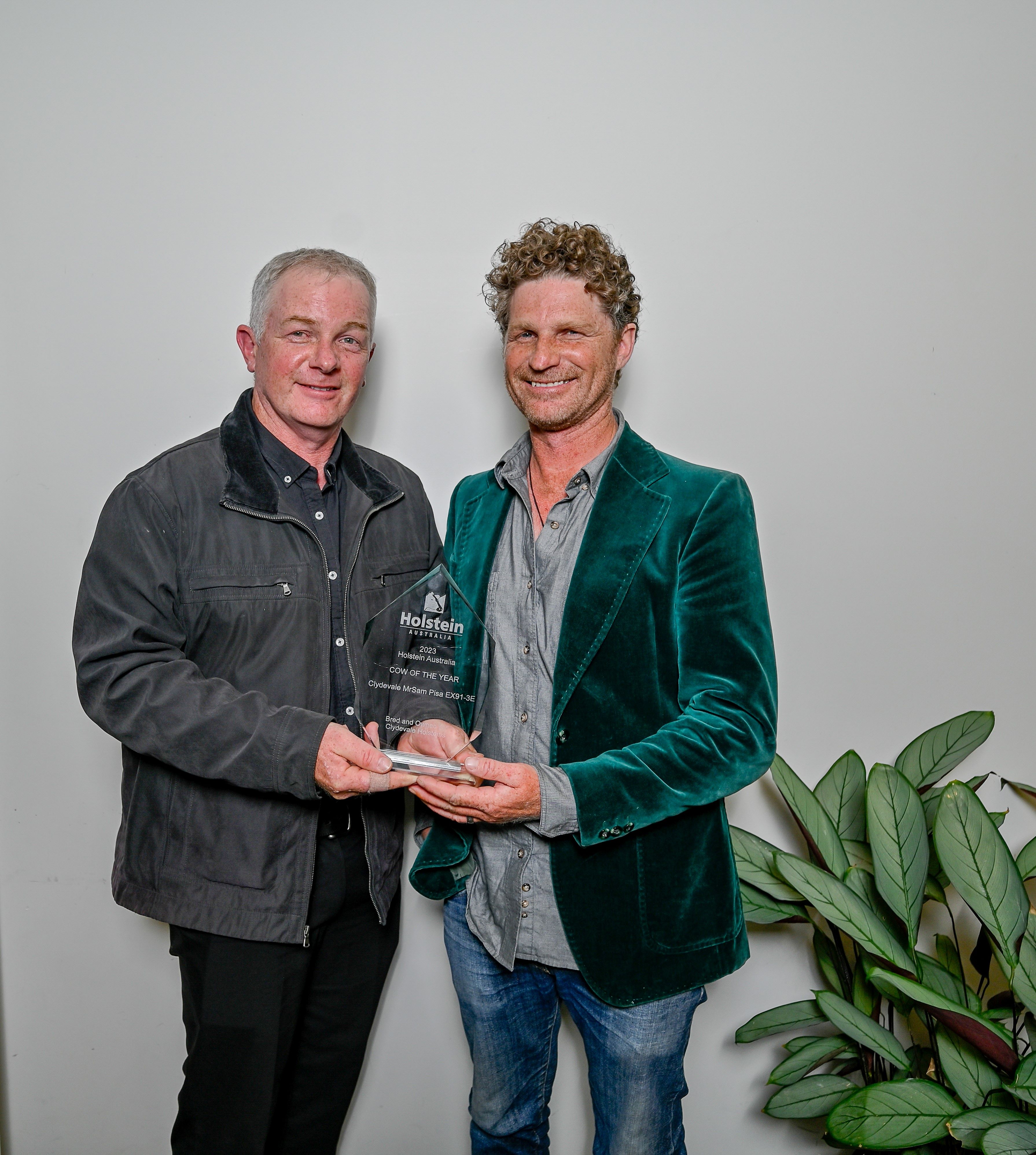 Adam and Colin Dee celebrate Clydevale Holsteins winning Cow of the Year
